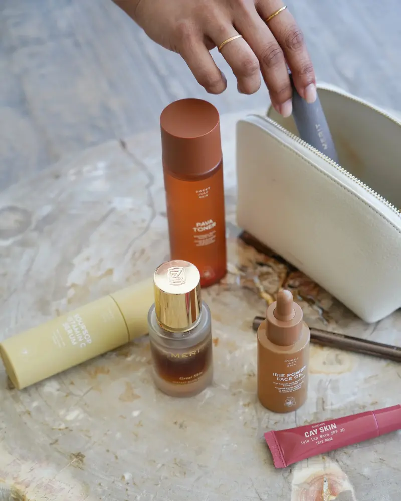 Selection of skincare products arranged on a surface as part of a daily skincare routine